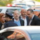 Weinstein arriving at the 1st Precinct building.